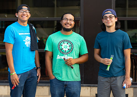 three students at Gatheration 